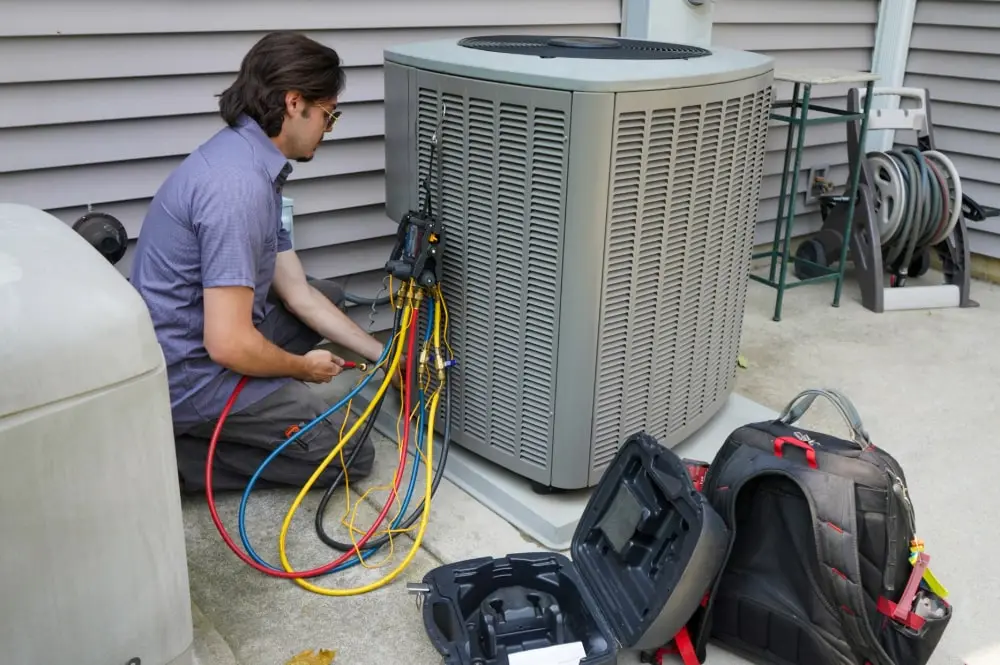 Eric Dale Heating and Air Conditioning worker providing repair services